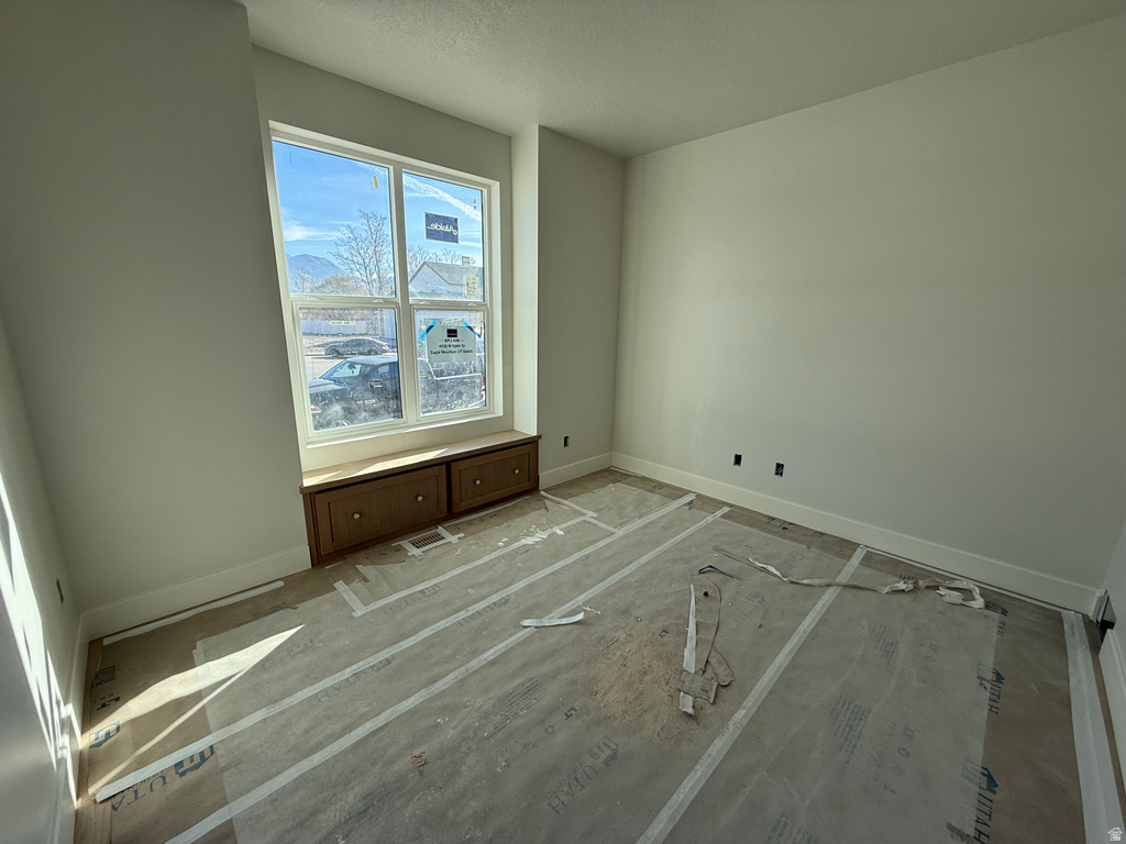 Spare room with baseboards