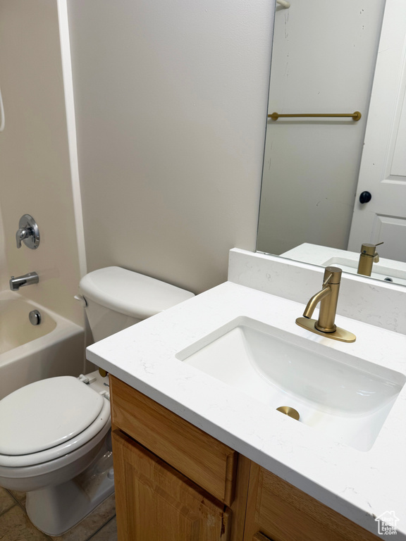 Full bathroom featuring vanity and bathing tub / shower combination