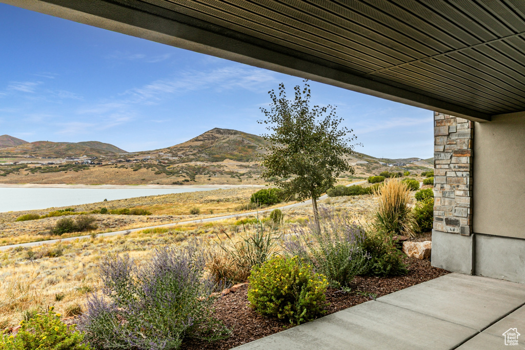 Mountain view featuring a nearby body of water