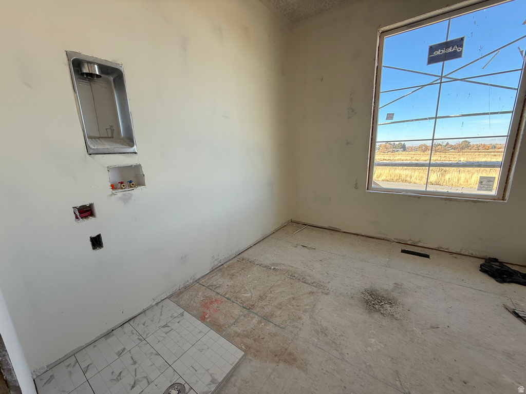 Washroom with hookup for a washing machine