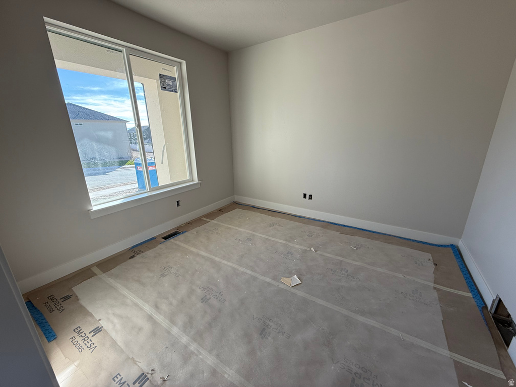 Empty room with baseboards
