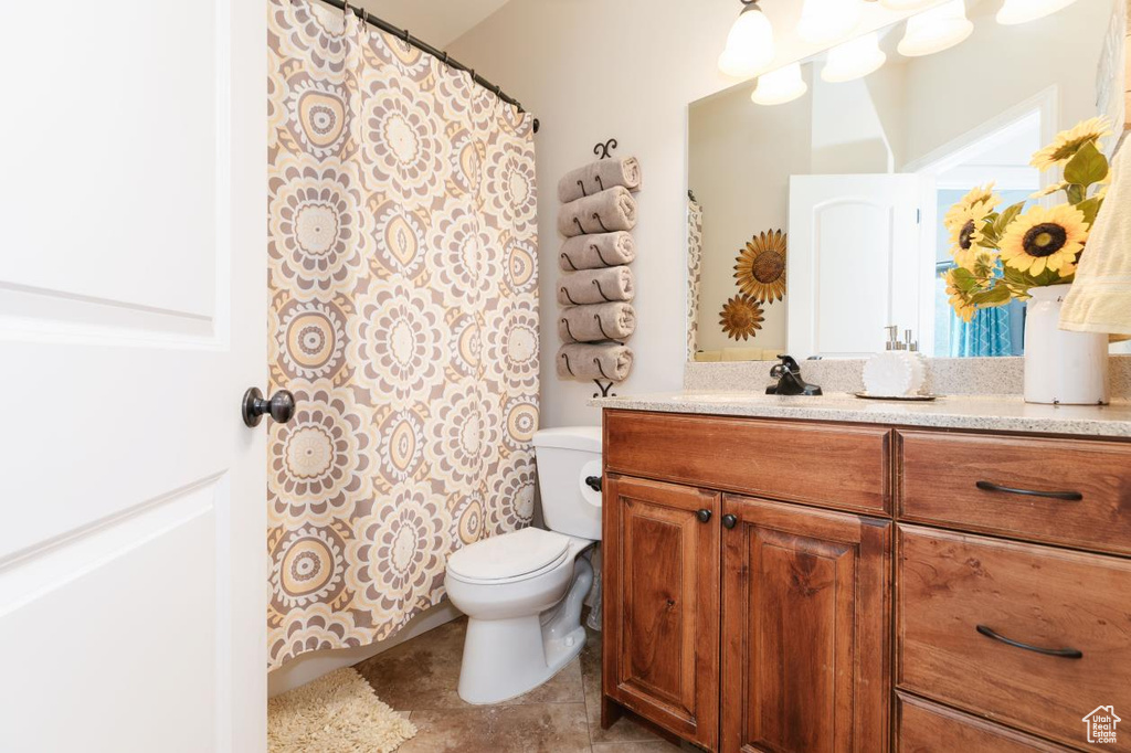 Bathroom with vanity and toilet