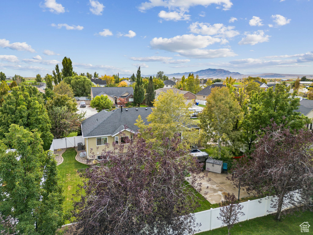 Aerial perspective of suburban area featuring mountains