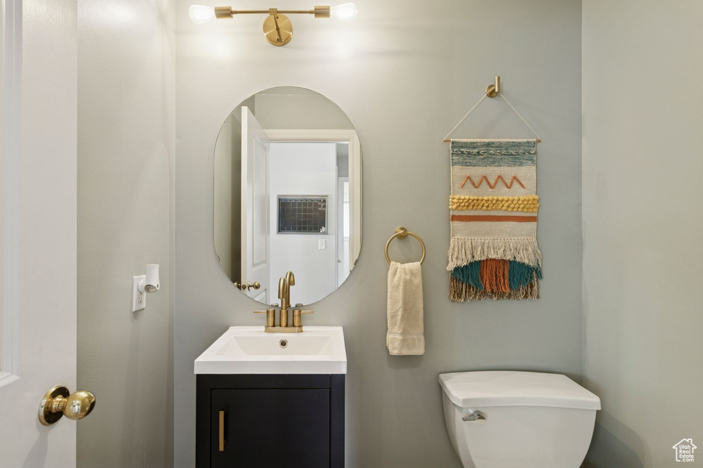 Bathroom with vanity and toilet