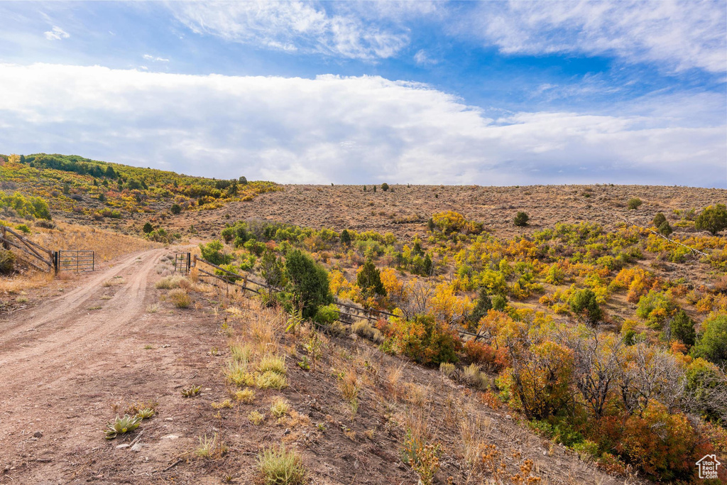 View of mountain backdrop with rural landscape