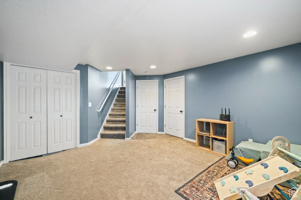 Playroom featuring carpet flooring and recessed lighting