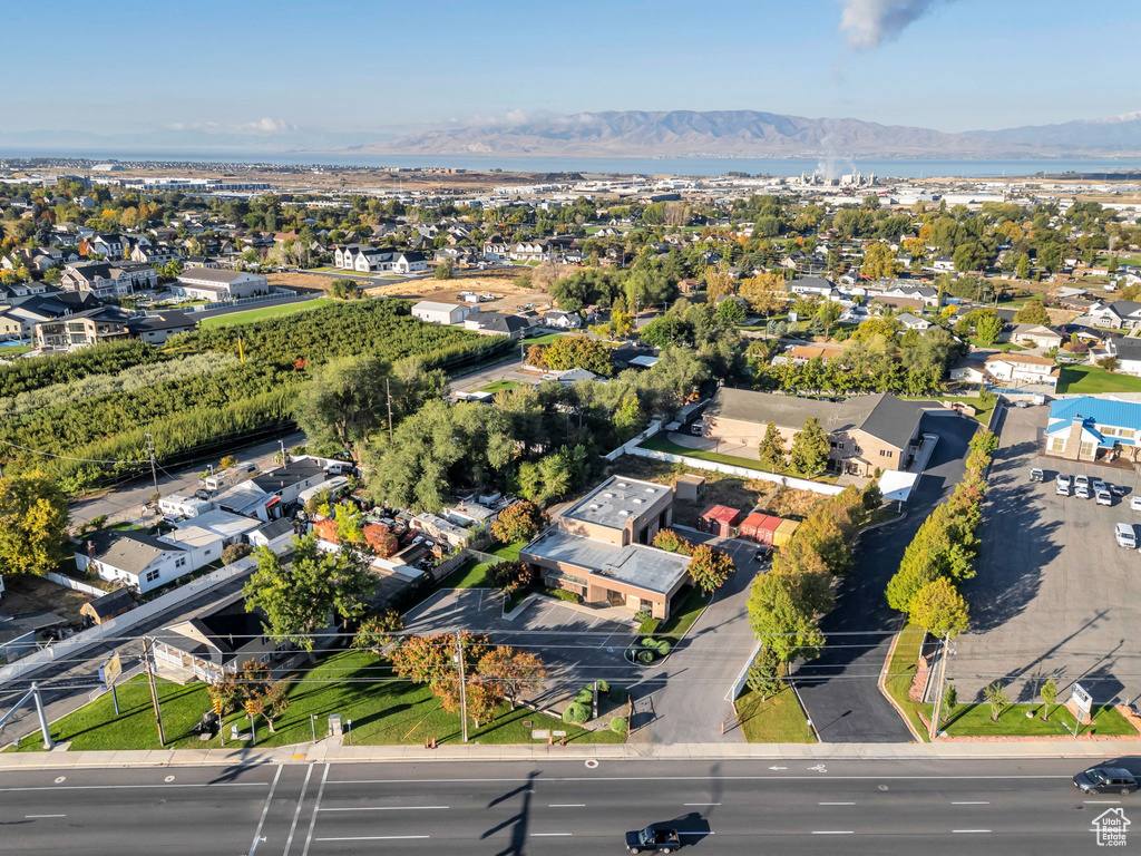 View of property location with nearby suburban area and a water and mountain view