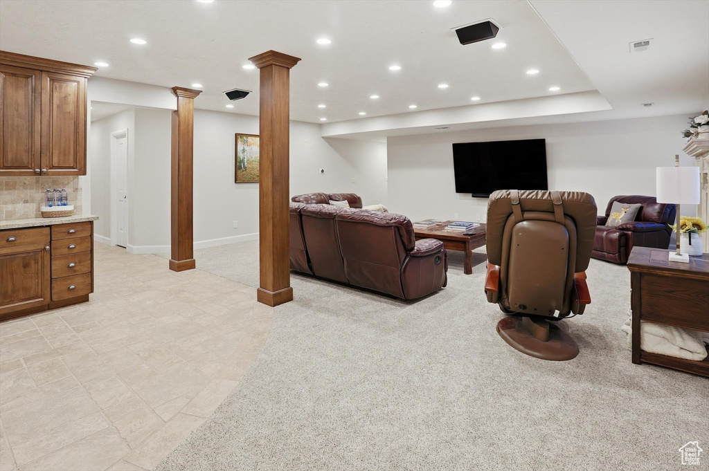 Cinema featuring recessed lighting and light carpet