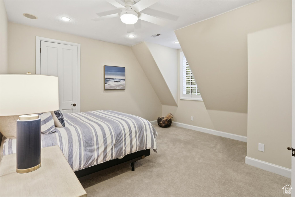 Bedroom with carpet, ceiling fan, and recessed lighting