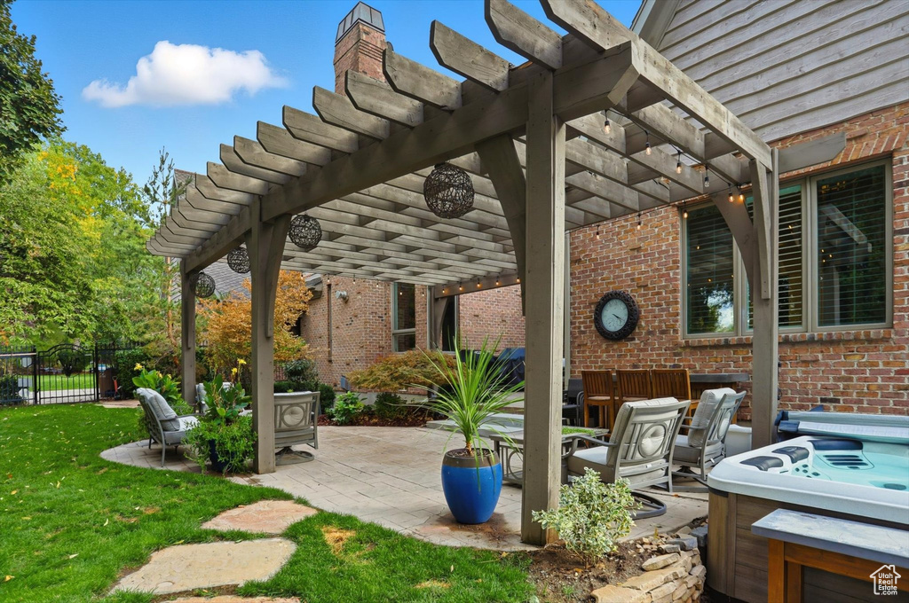 View of patio / terrace with a pergola and outdoor dining area