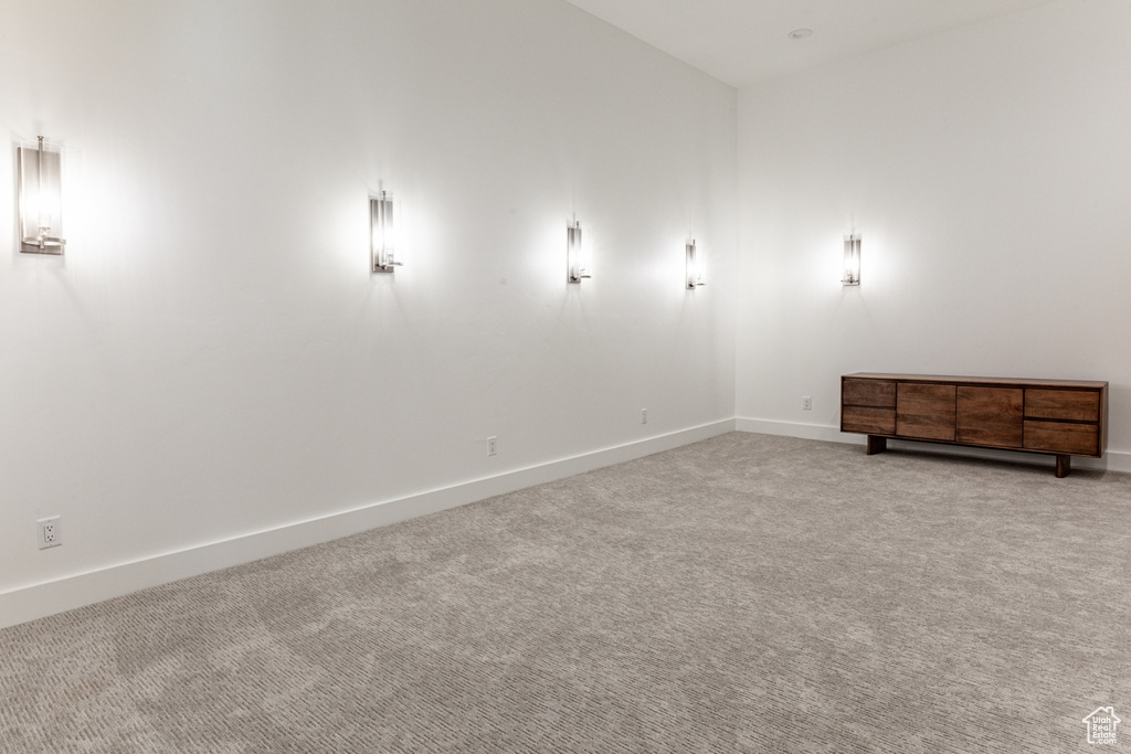 Cinema with carpet floors and baseboards