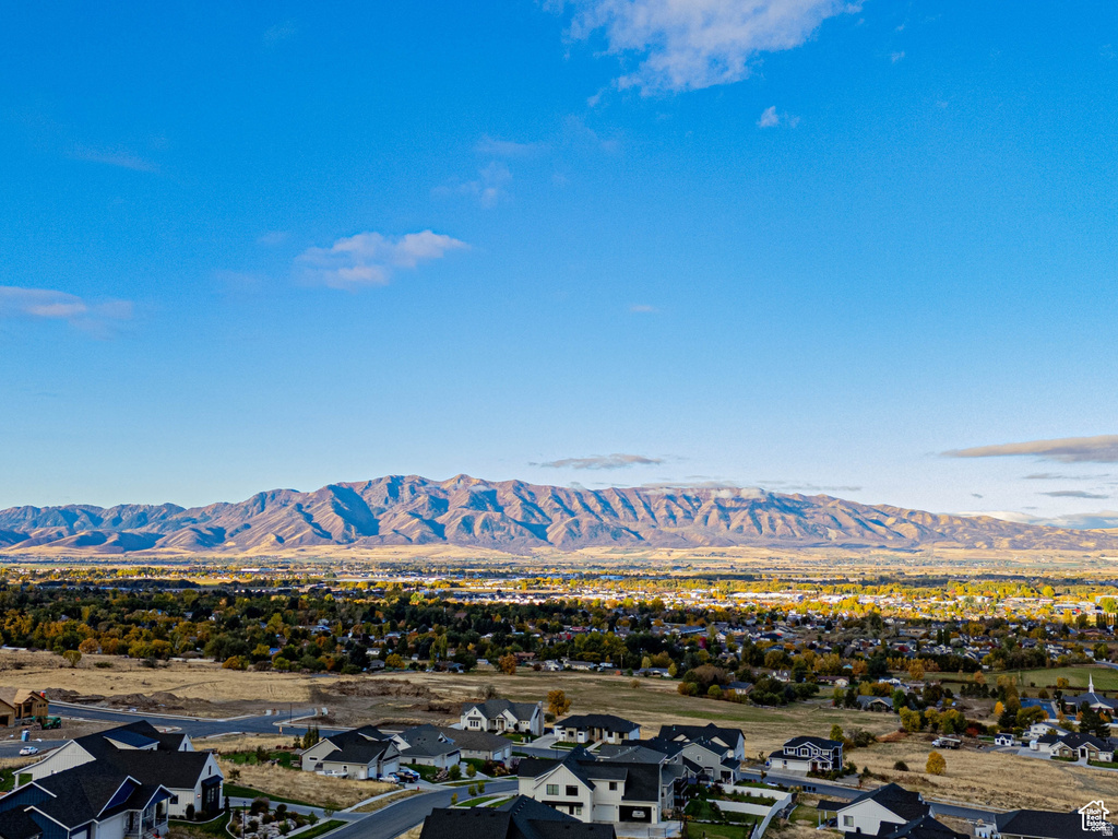 View of mountain background featuring nearby suburban area