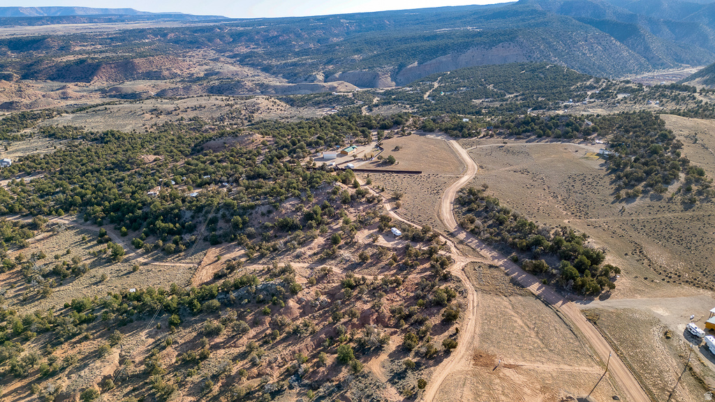 View of property location featuring a mountain backdrop and rural landscape
