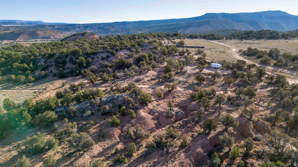 Aerial view of property\'s location featuring mountains