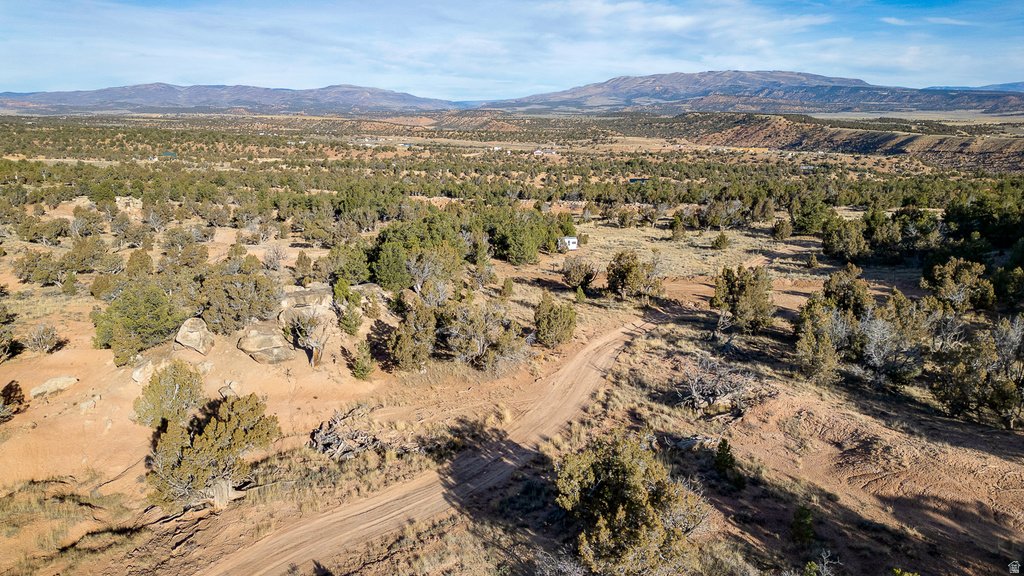 Aerial view of property\'s location featuring mountains