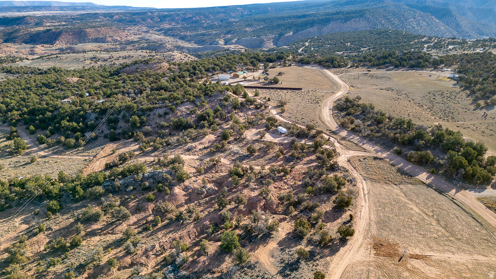 Aerial view of property\'s location with mountains and rural landscape
