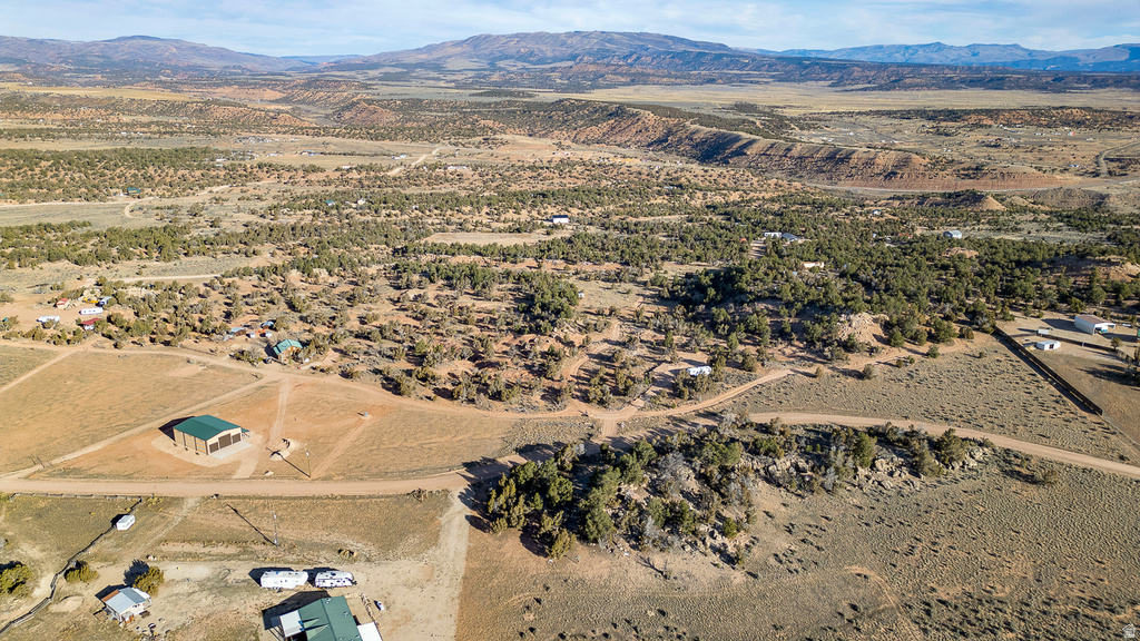 Aerial view of property\'s location with mountains and rural landscape