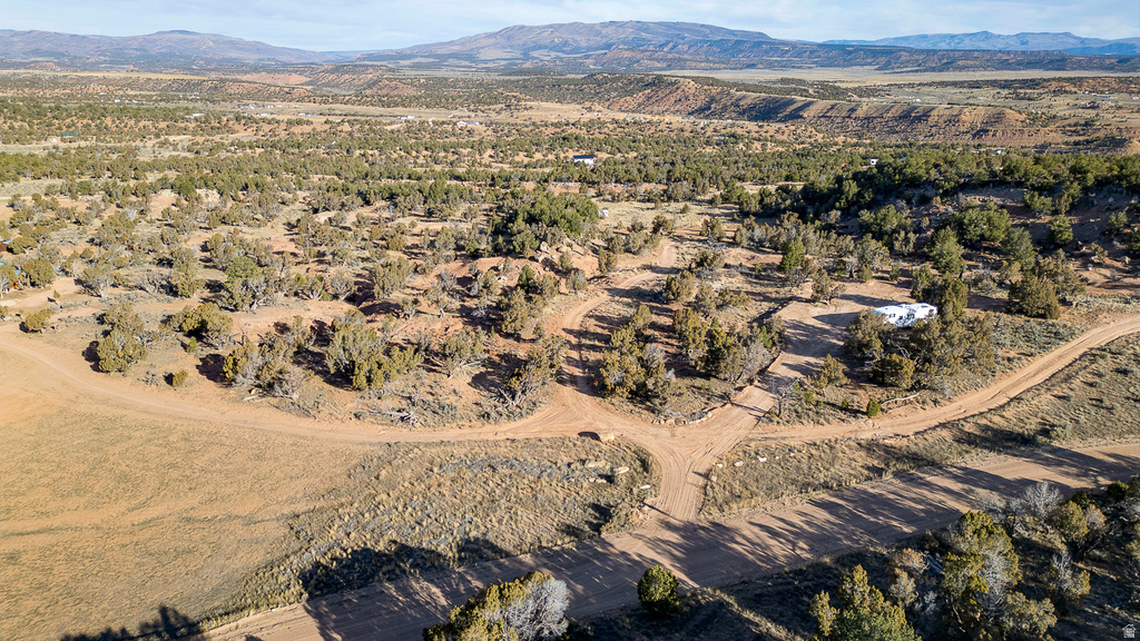 Aerial view of property\'s location featuring mountains