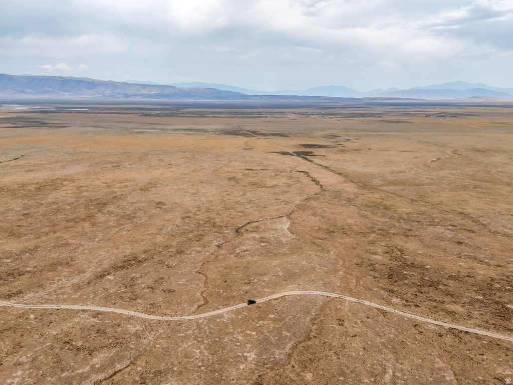 View of property location featuring rural landscape and a mountainous background