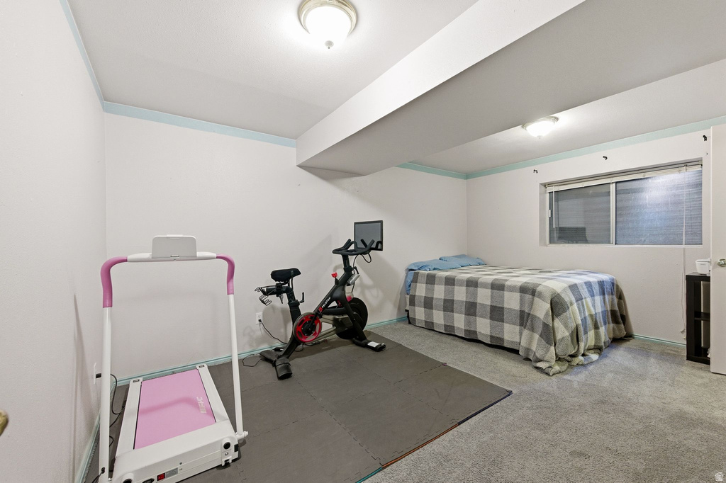 Bedroom featuring carpet flooring
