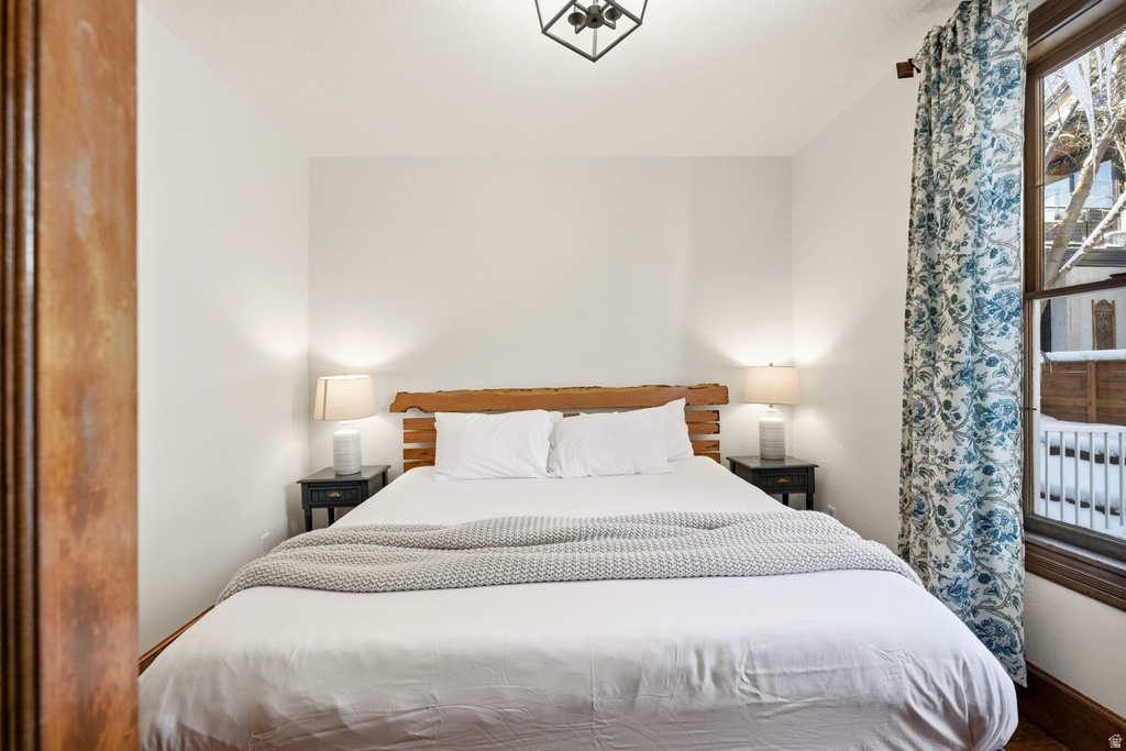 Neutral wall tones with wood-finish flooring