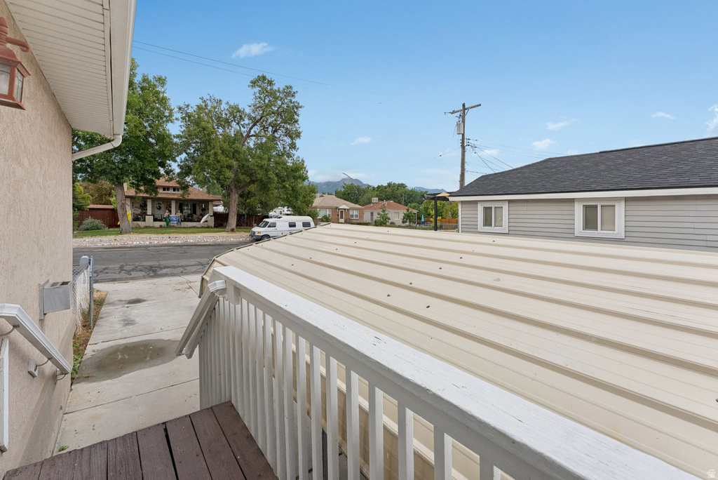 Wooden deck featuring a residential view