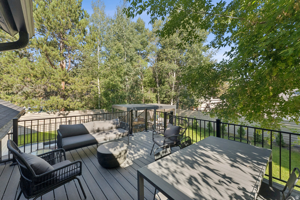 Deck featuring outdoor lounge area