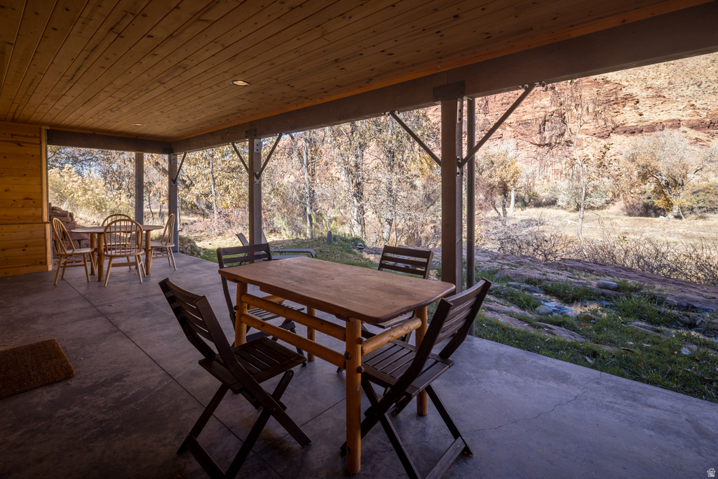 View of patio with outdoor dining area