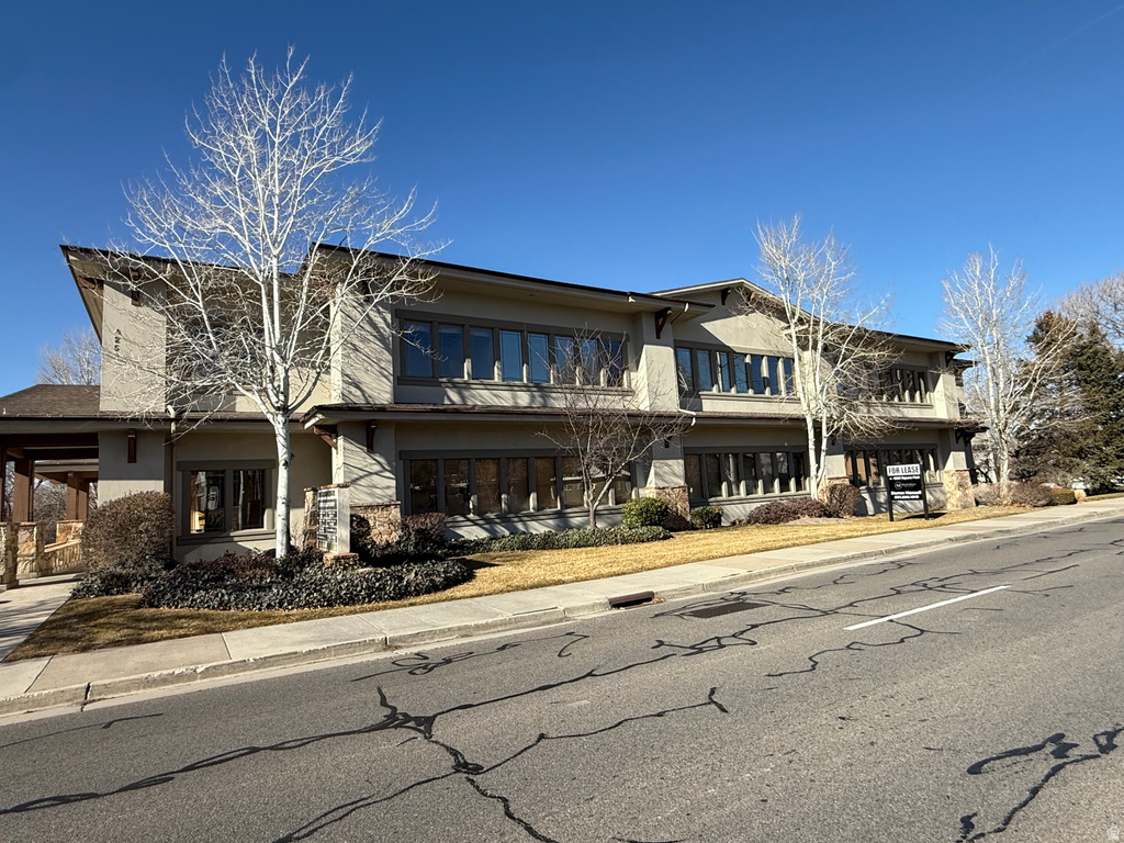 View of front of house featuring stucco siding