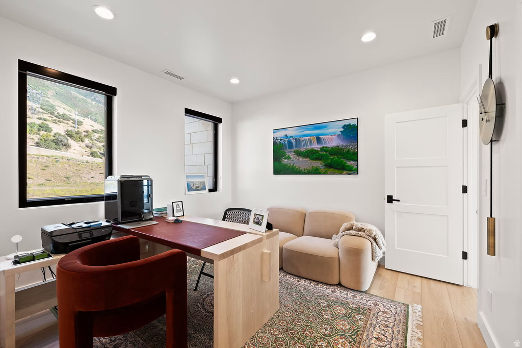Office featuring recessed lighting and light wood-style flooring