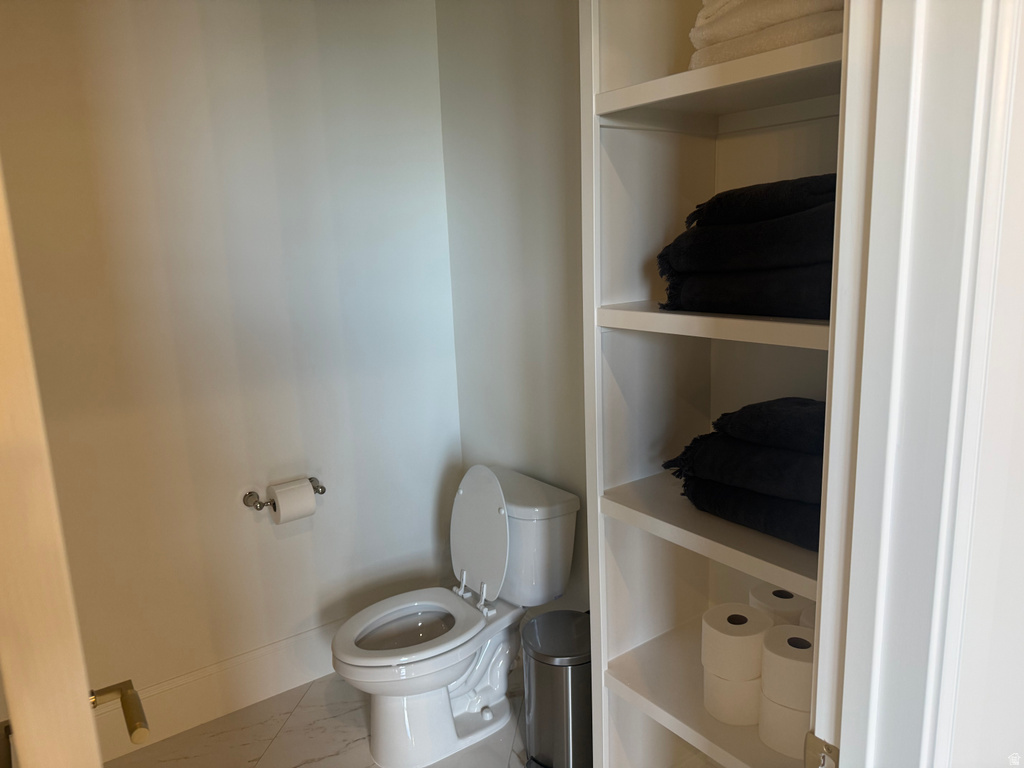 Recessed shelving unit featuring multiple storage shelves
