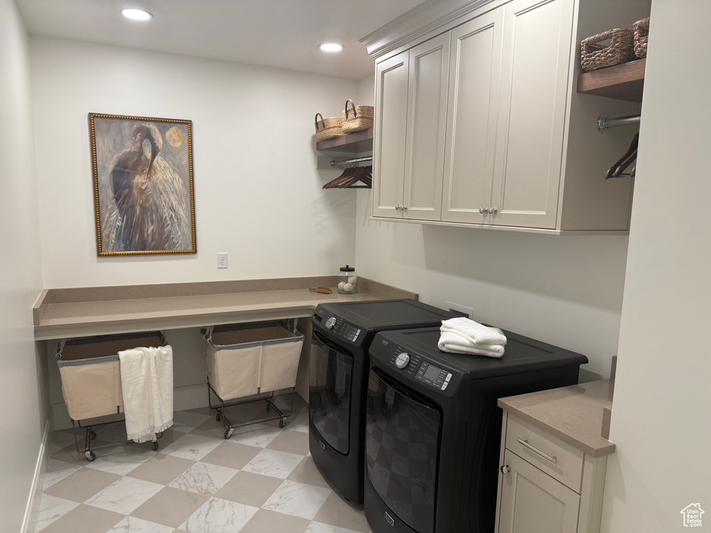 Utility room featuring checkerboard pattern flooring, light-toned countertops, and recessed lighting
