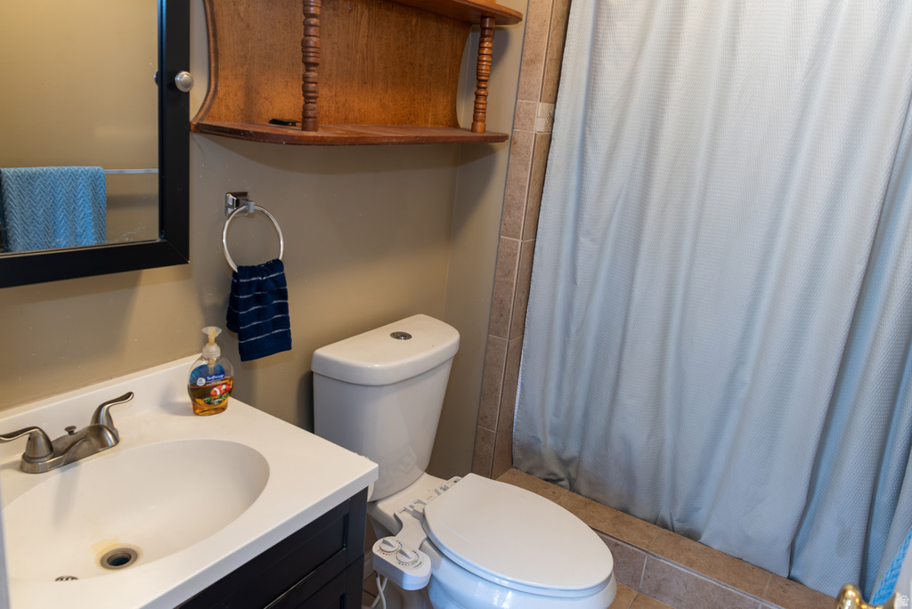 Full bathroom featuring vanity and a stall shower