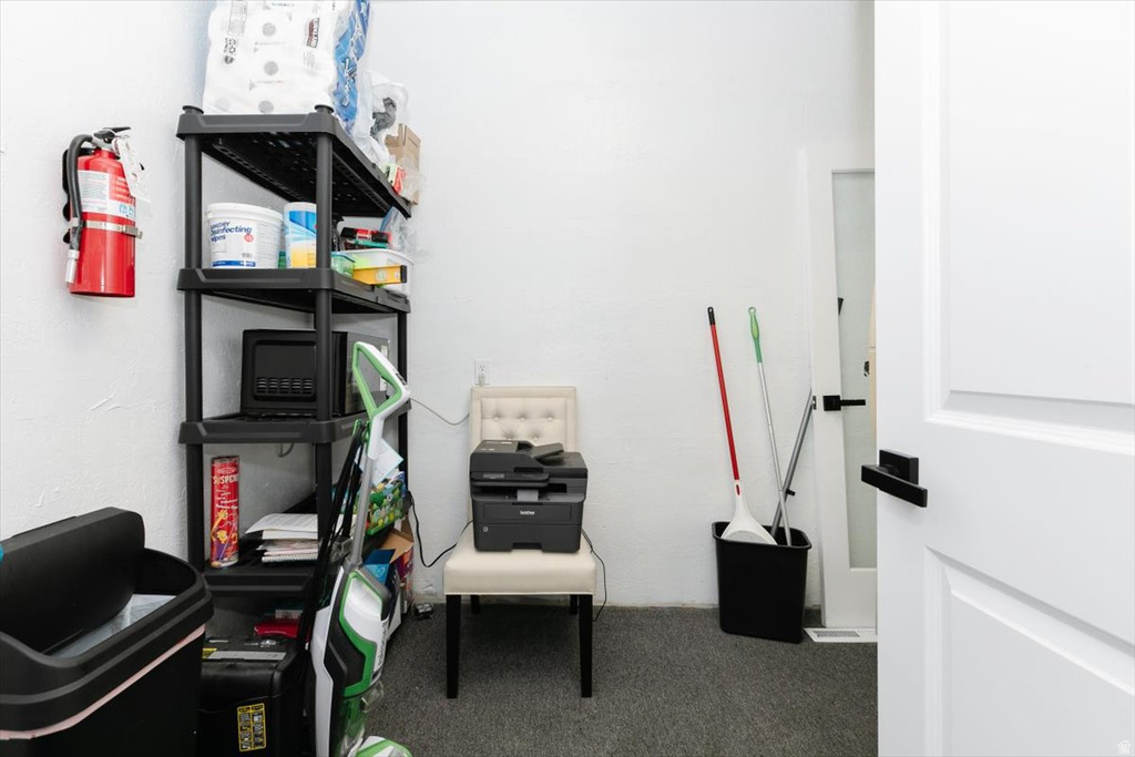 View of carpeted home office