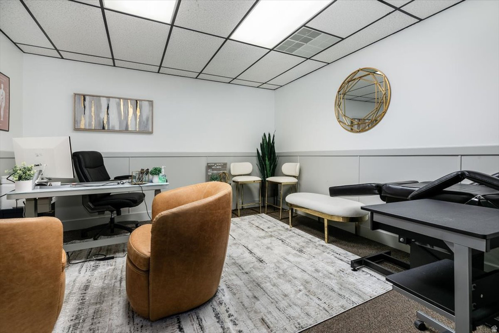 Office featuring a paneled ceiling