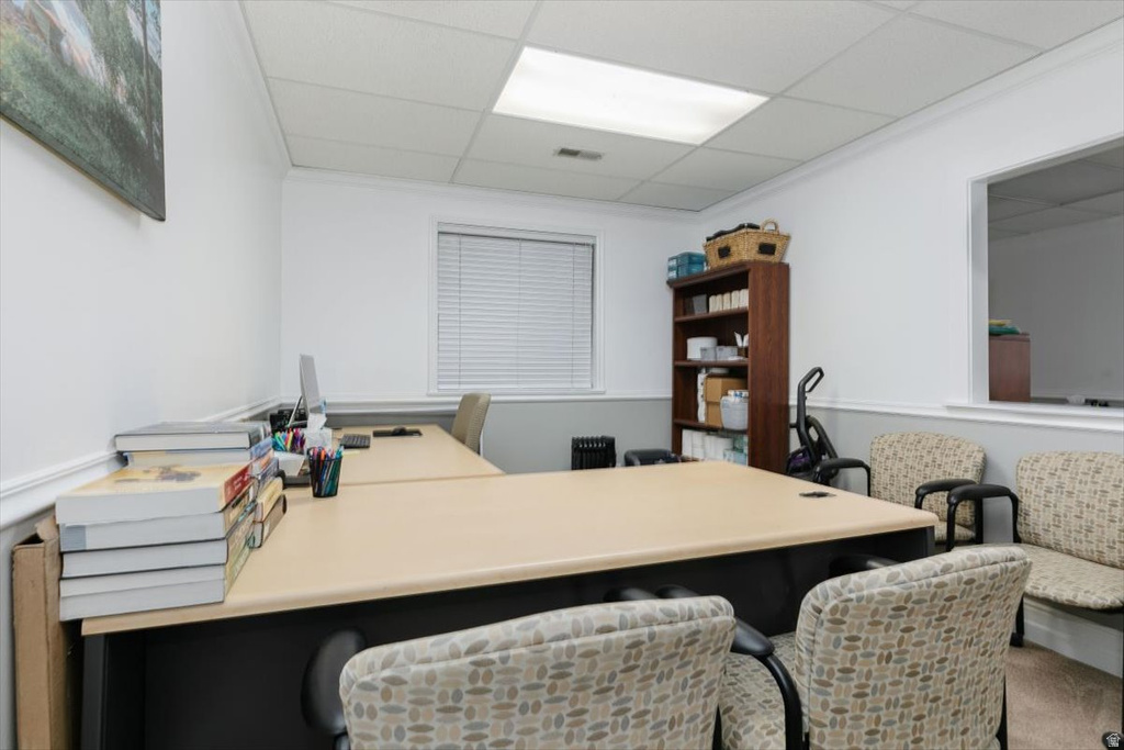 Office space featuring a drop ceiling