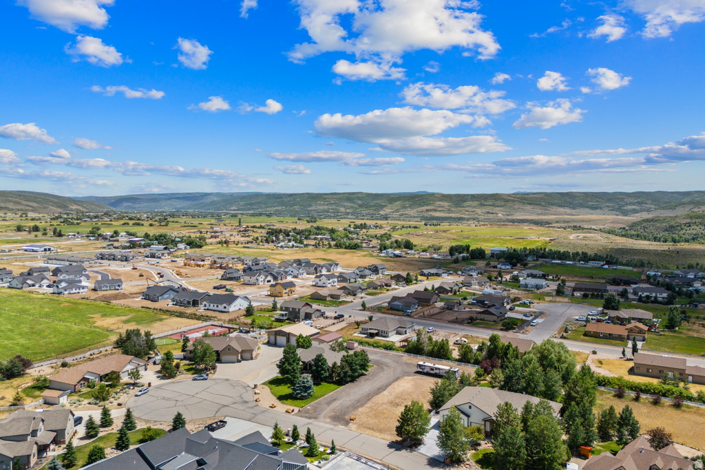Aerial view of residential area with a mountain backdrop