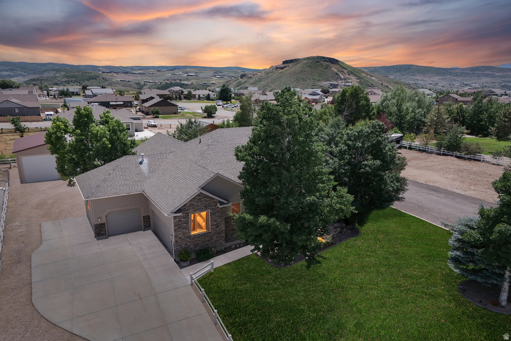 View of subject property featuring a mountain backdrop