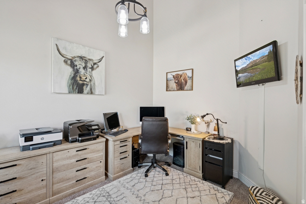 Office with carpet flooring and baseboards