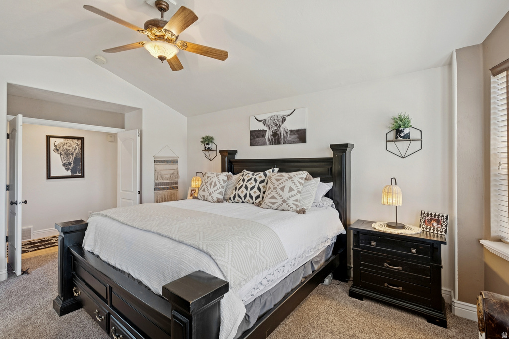 Bedroom featuring light carpet and ceiling fan
