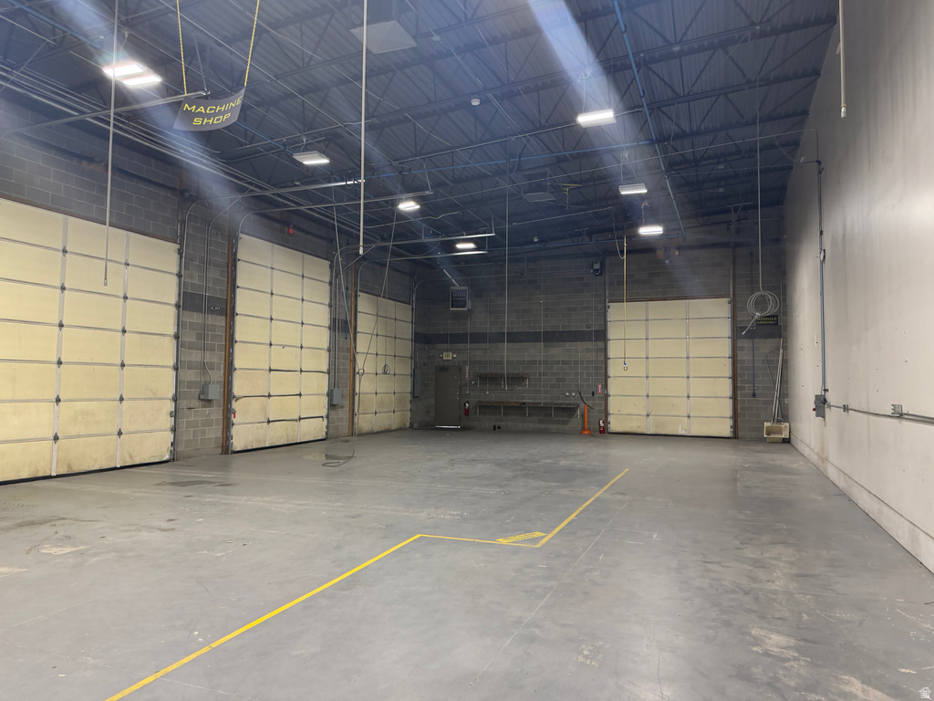Garage with a heating unit and a garage door opener