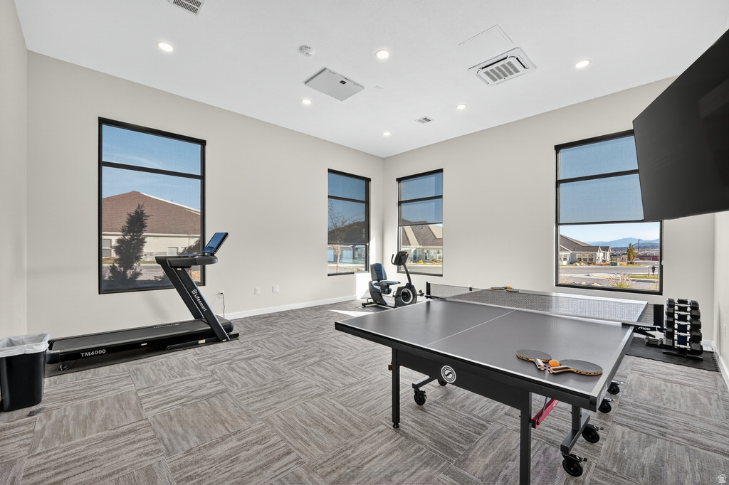 Game room featuring recessed lighting