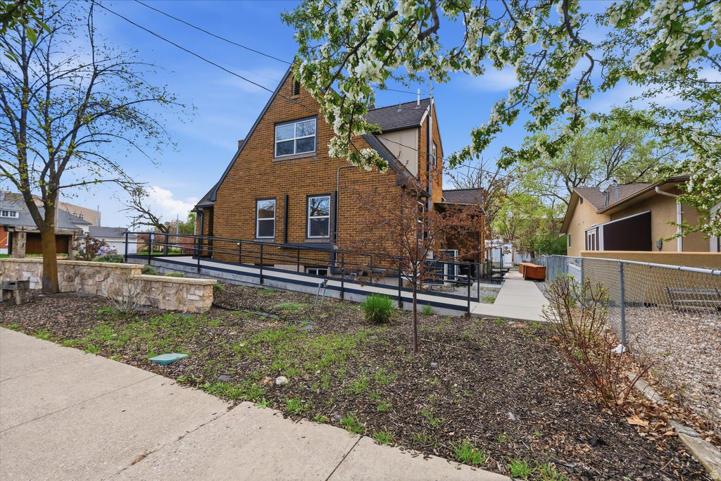 Back of property with brick siding