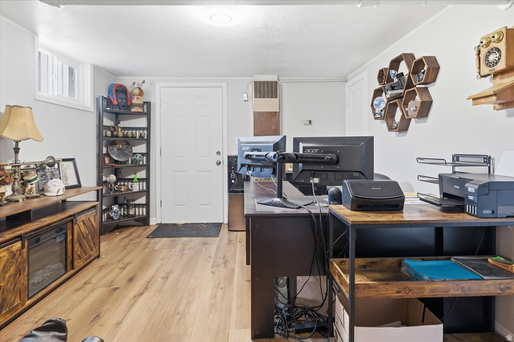 Office space featuring light wood finished floors