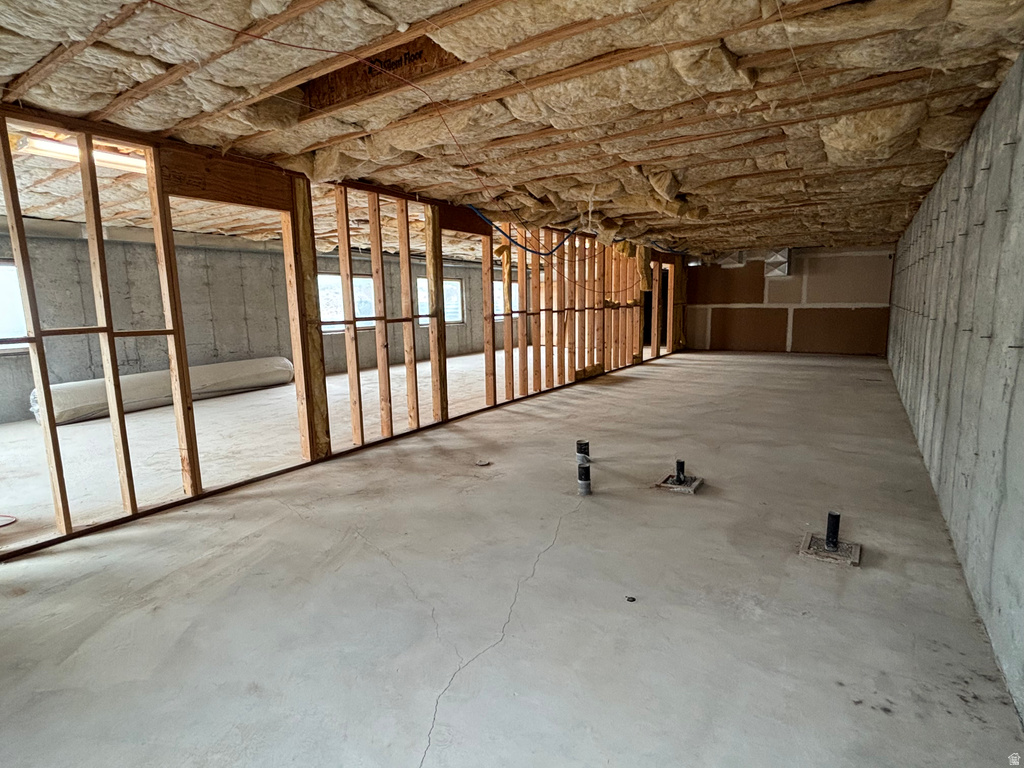 Misc room with unfinished concrete flooring