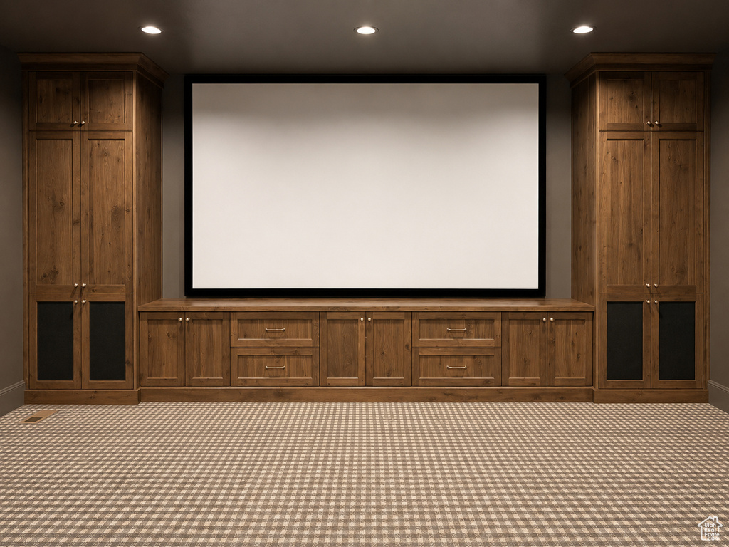 Integrated media screen with custom built-in cabinetry, recessed lighting, and patterned carpet flooring