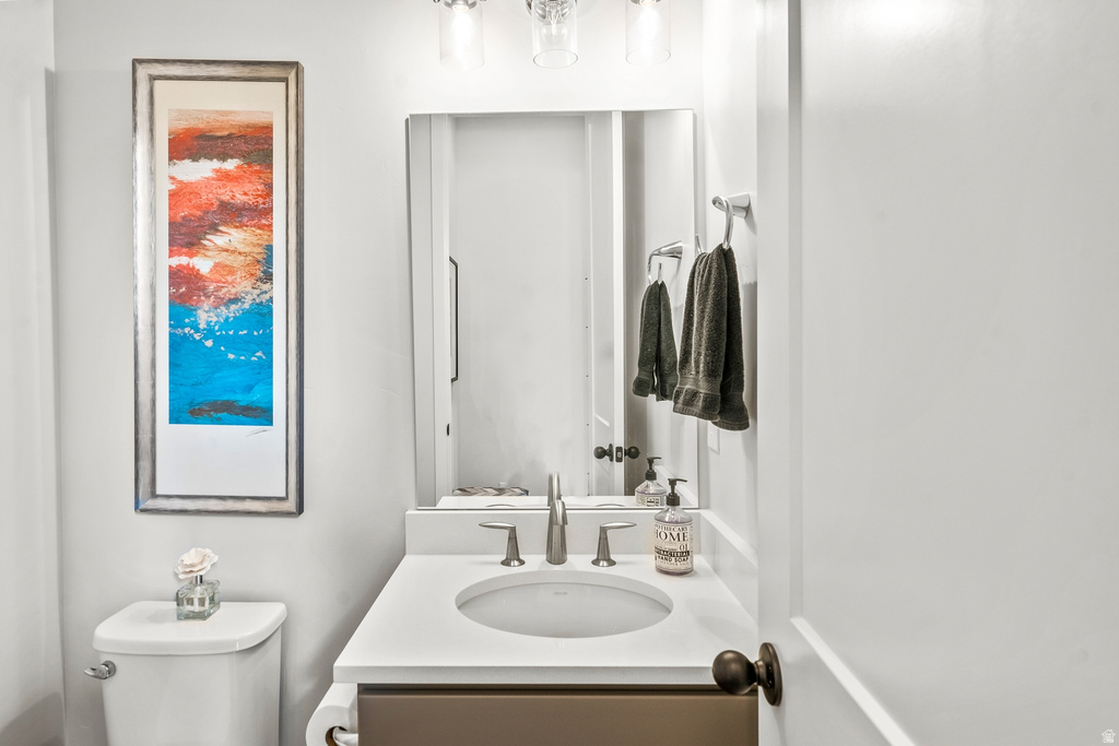Bathroom featuring toilet and vanity
