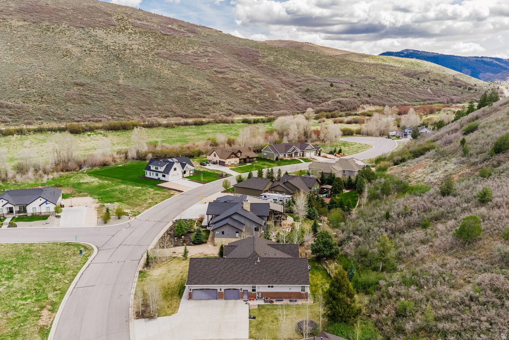 Aerial view of residential area with mountains