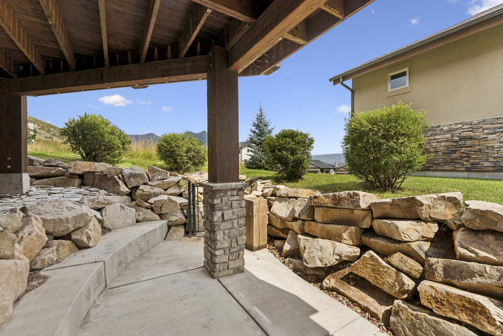 View of patio / terrace with a mountain view