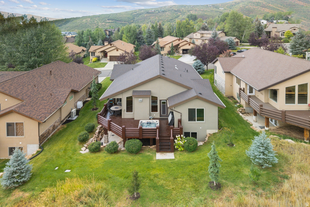 Aerial perspective of suburban area featuring mountains